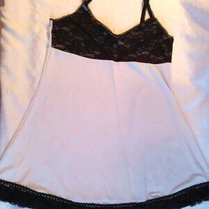 Pretty vintage white camisole with black lace at the chest and bottom